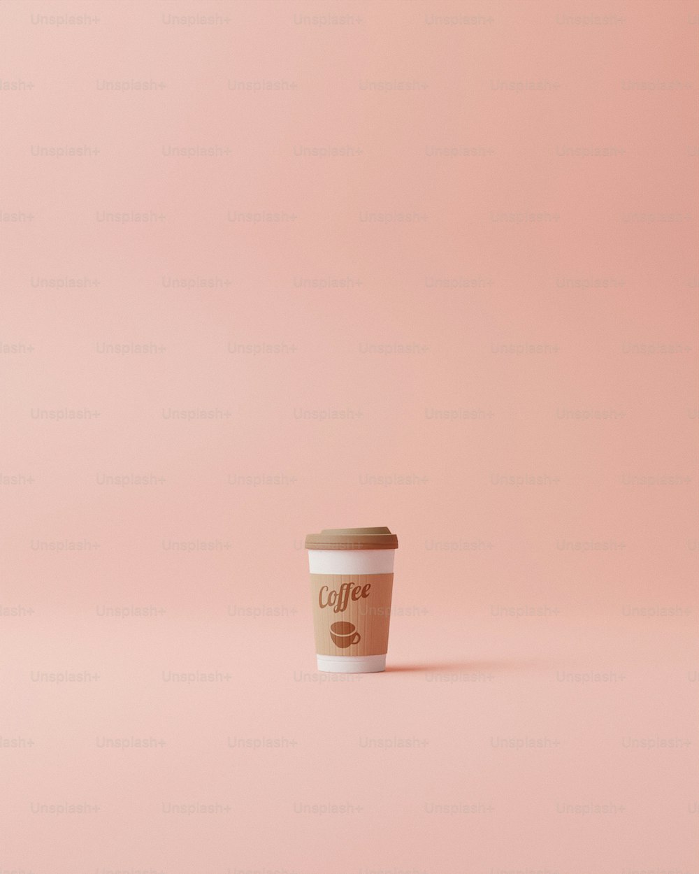 una tazza di caffè su uno sfondo rosa