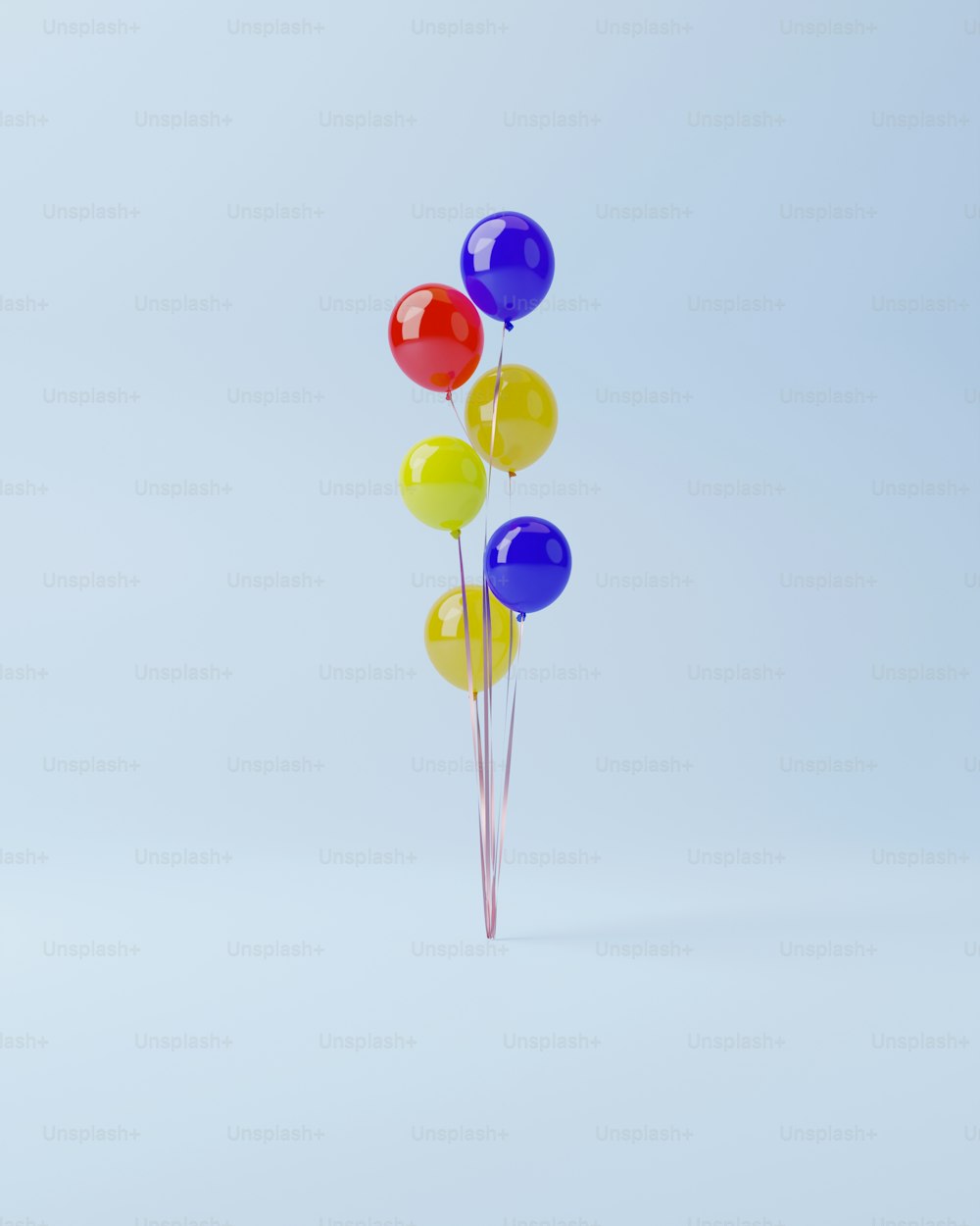 a bunch of balloons that are in the air