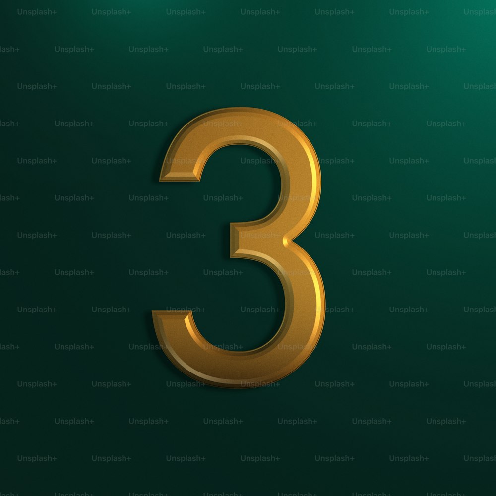 a gold number three on a green background