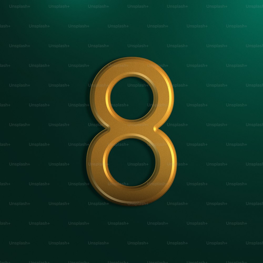 a gold number eight on a green background