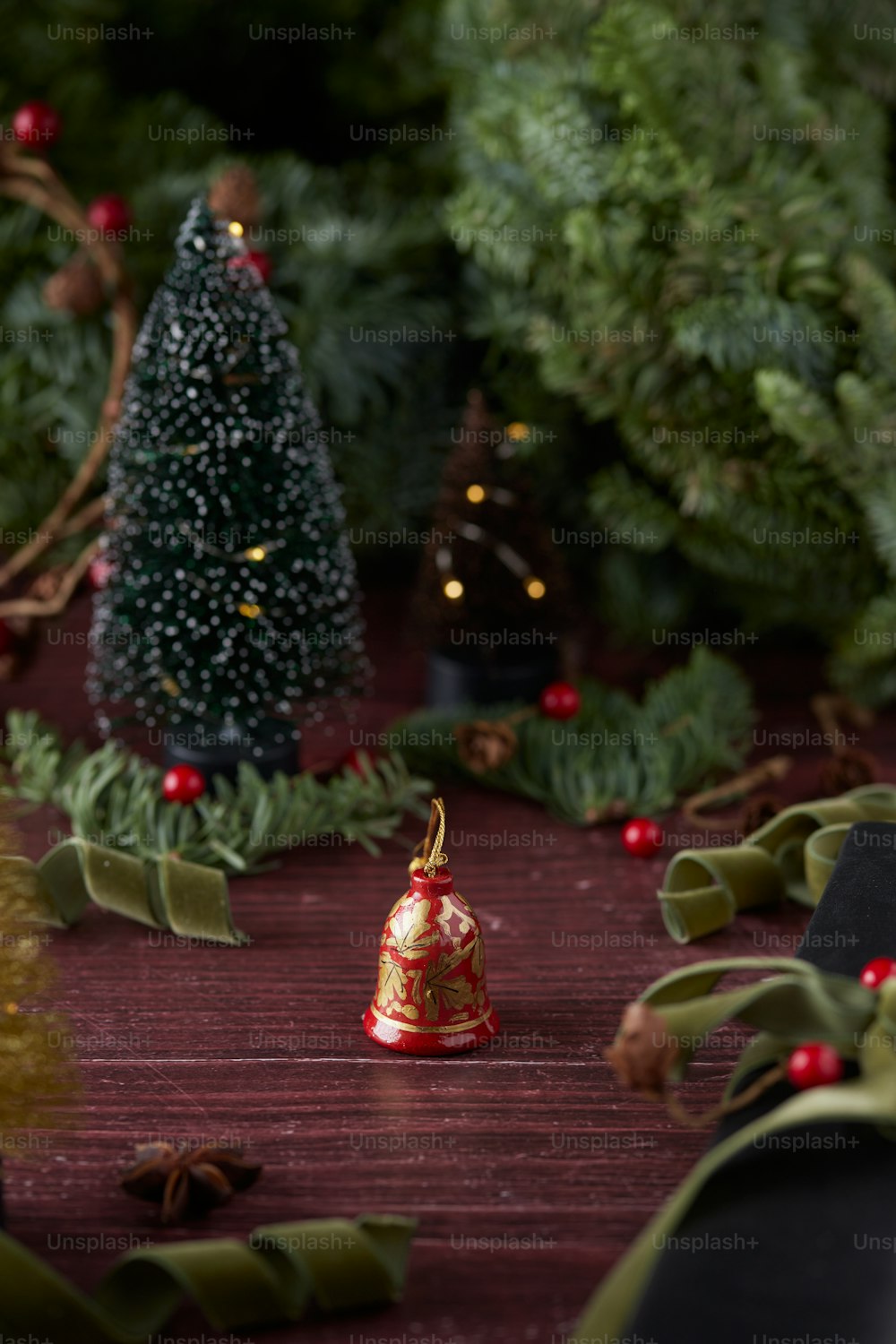 a small bell sitting on top of a wooden table