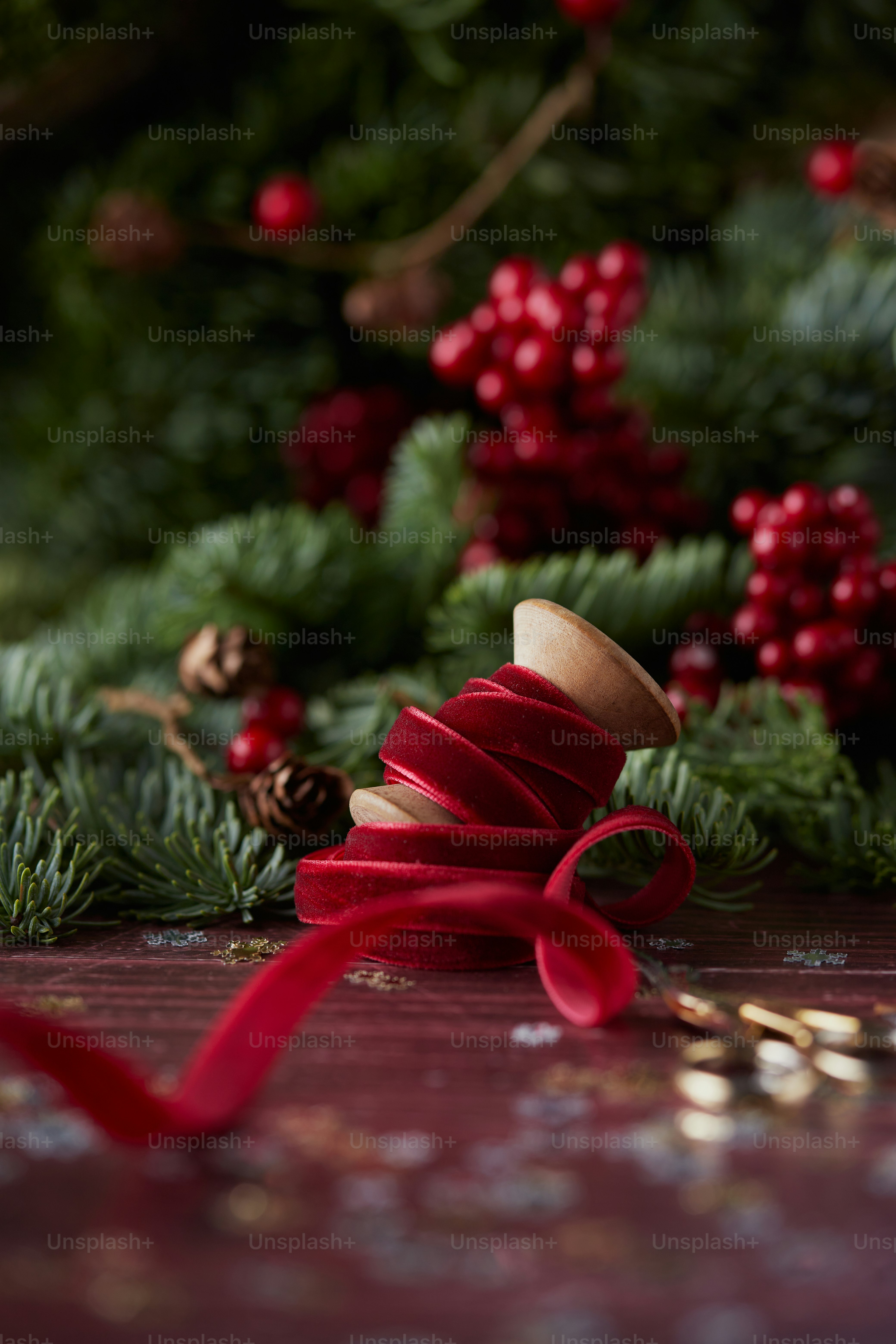 a close up of a red ribbon on a table