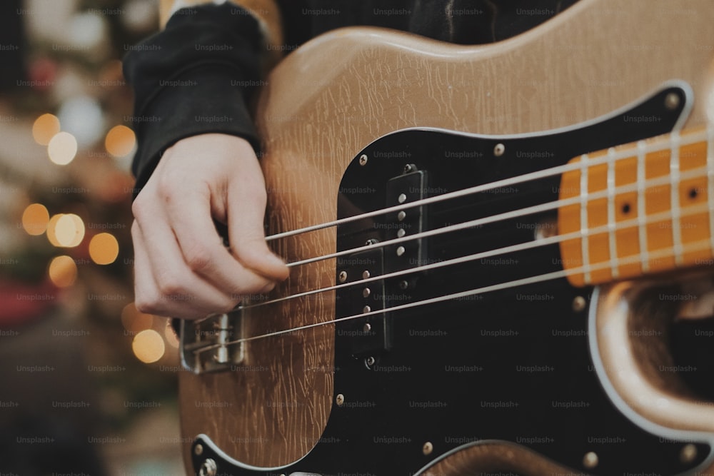 a person playing a guitar