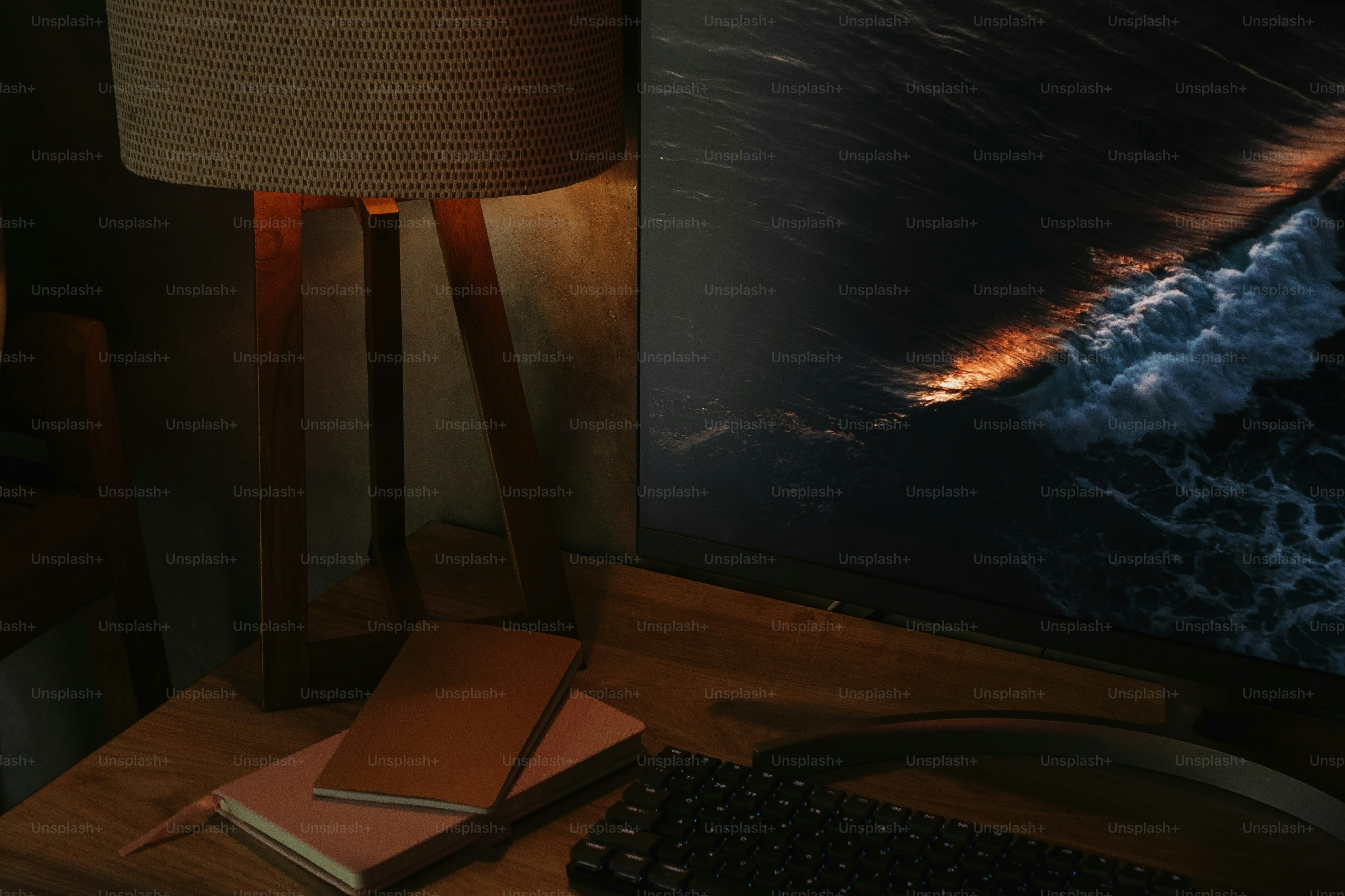 a desk with a computer and a chair with a view of the earth