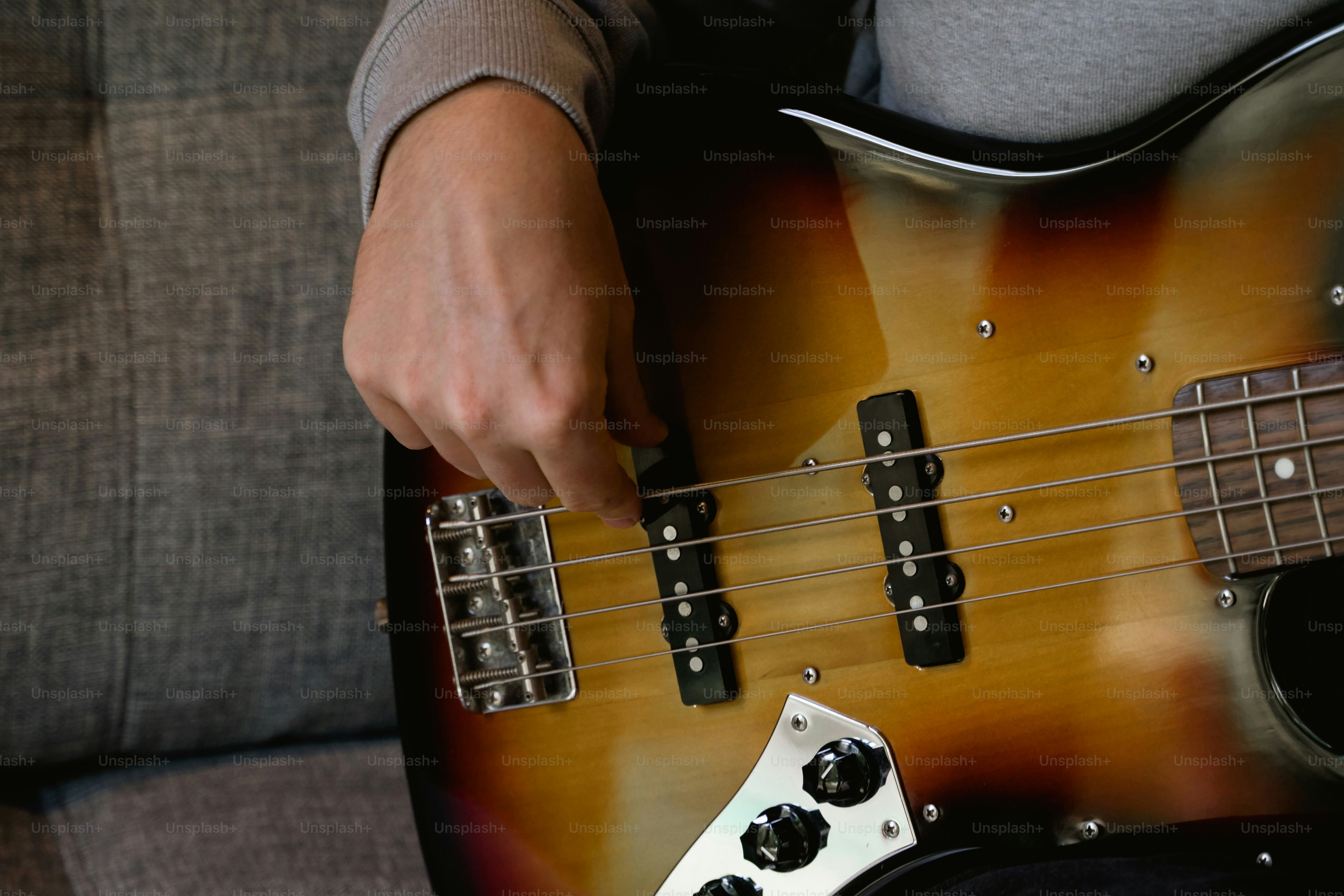 a person playing a guitar