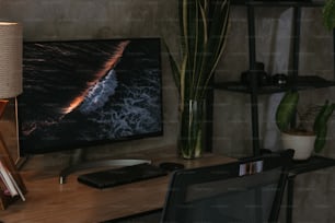 a fireplace with a tv and a remote control on a table