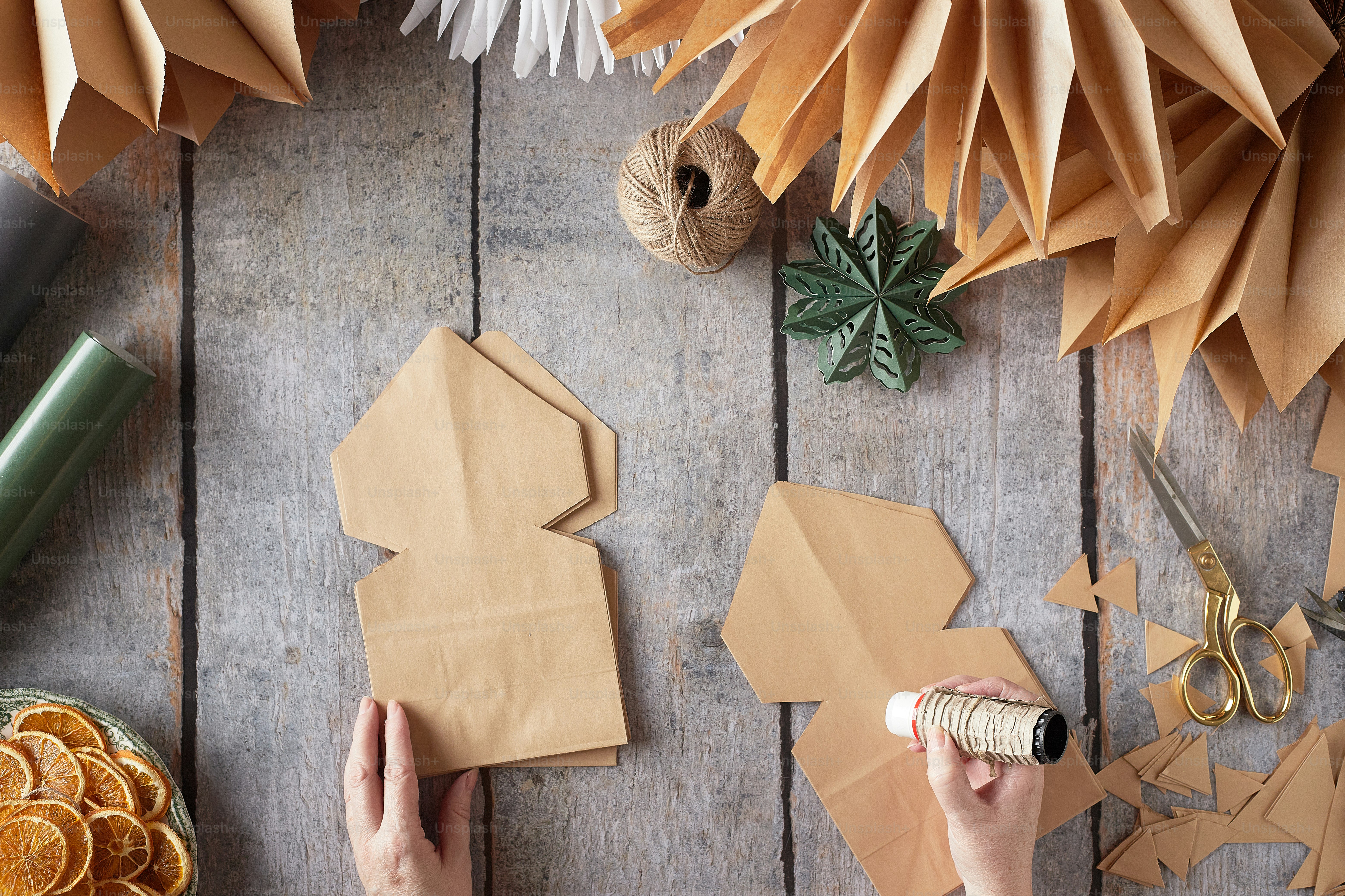 a person holding a piece of wood
