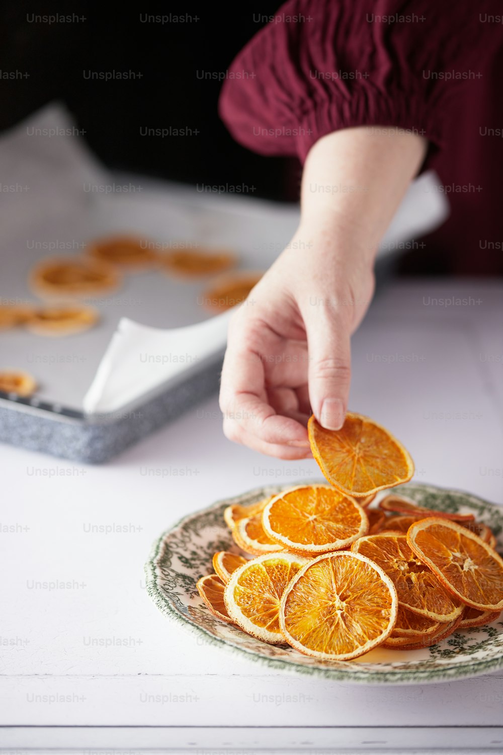 a person slicing a fruit