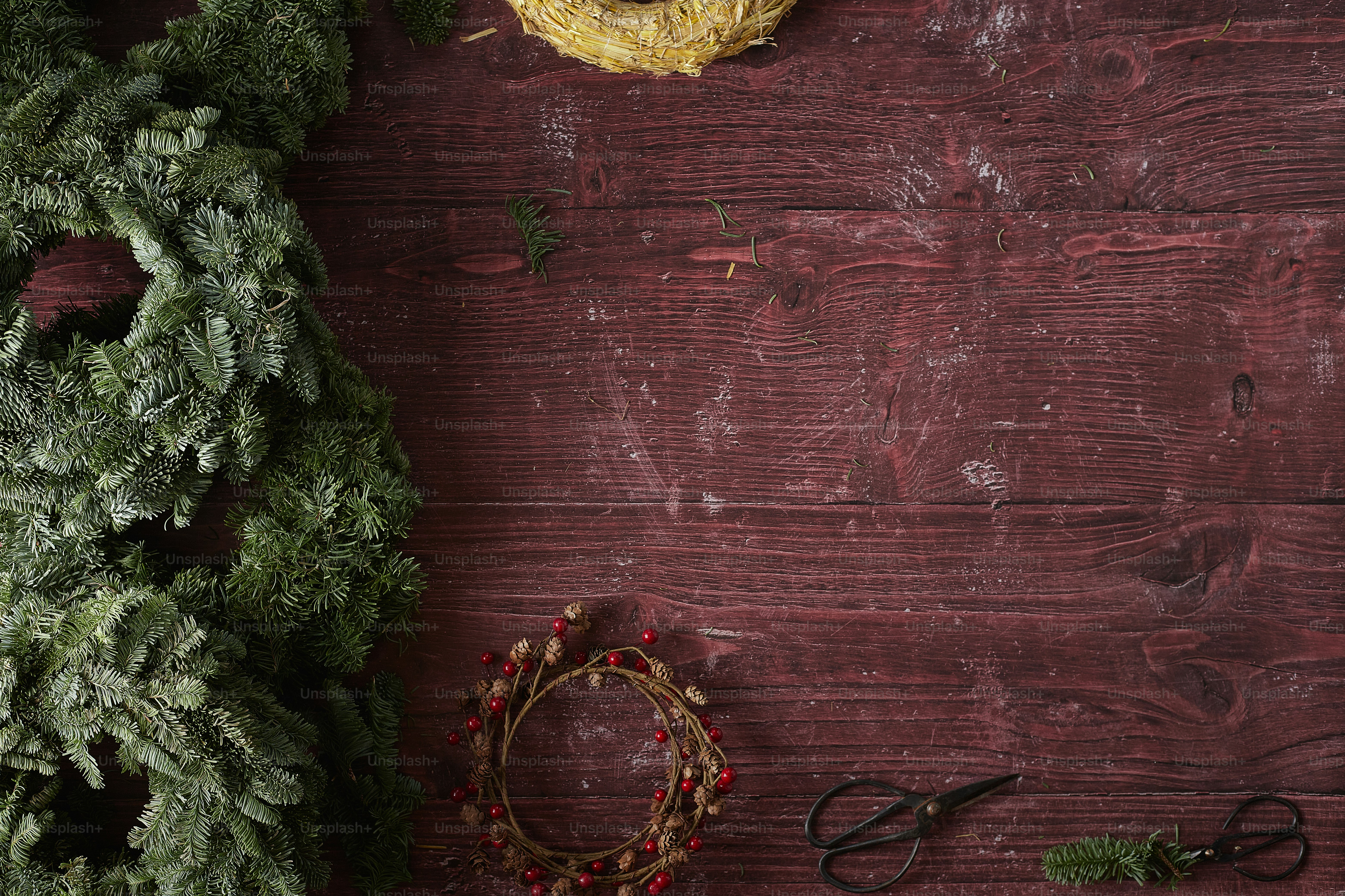 a wood surface with a tree and glasses on it