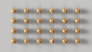 a set of twelve golden christmas ornaments