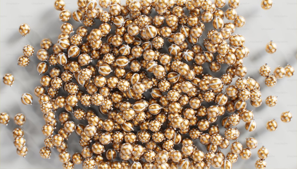 a close up of a bunch of gold beads