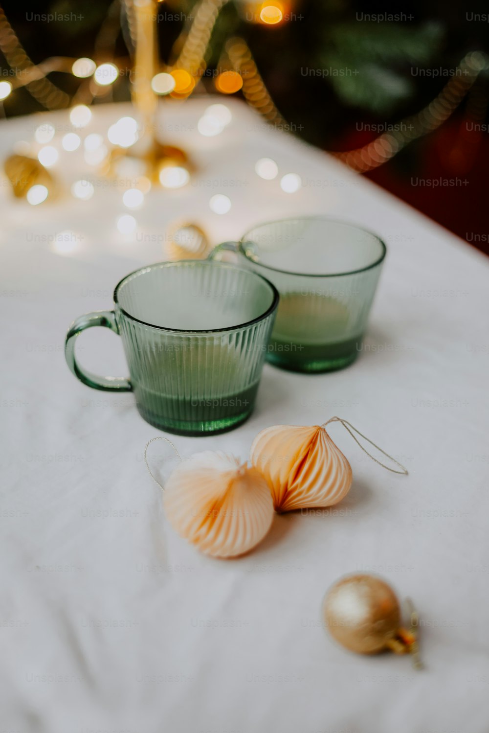 a table with a cup and a plate of food