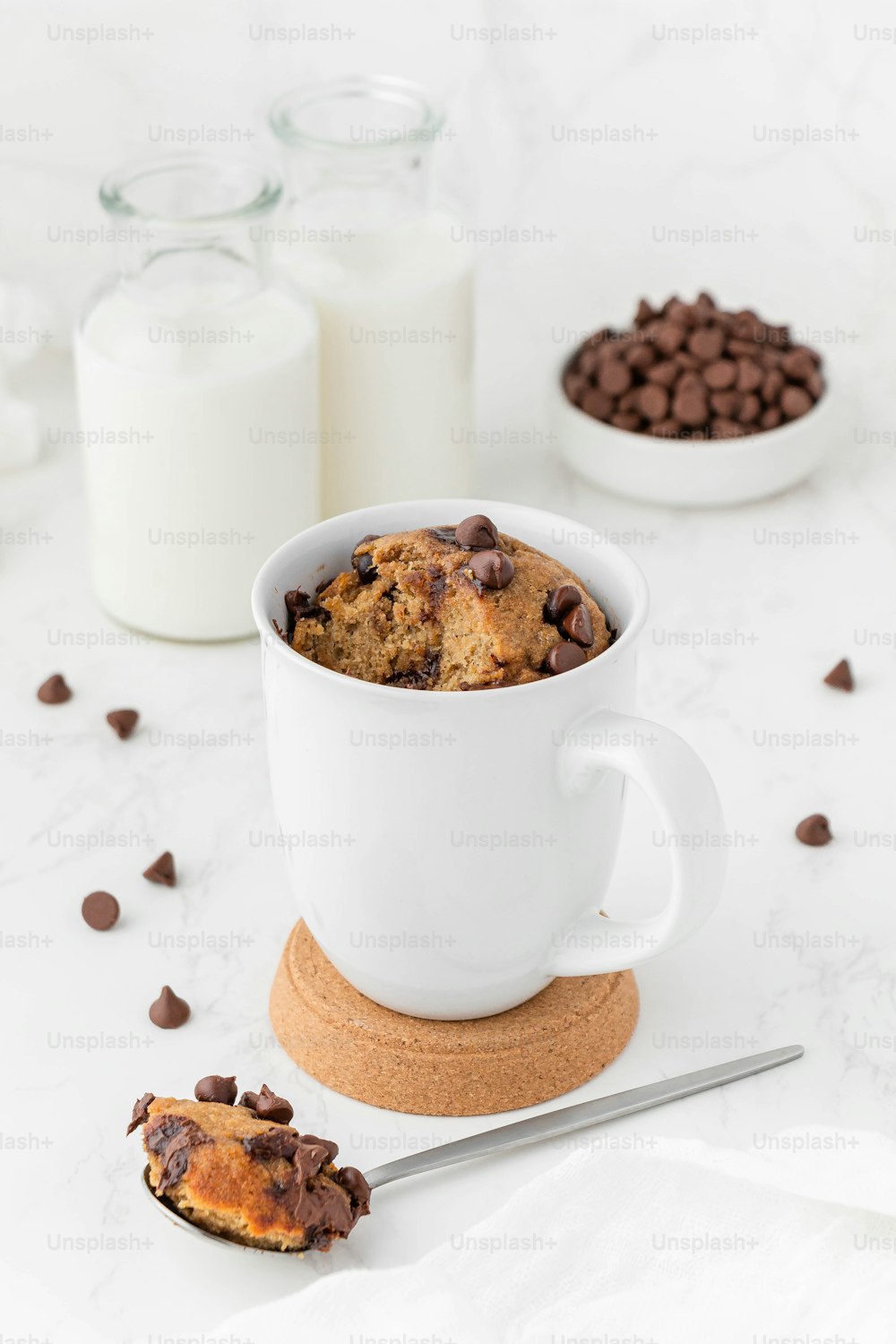 a cup of milk and cookies
