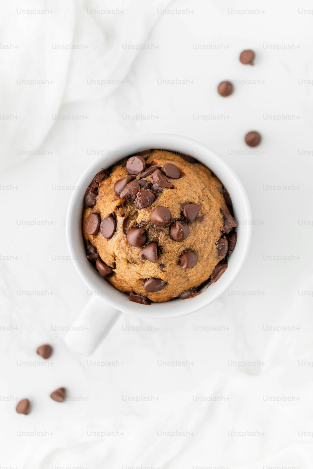 a cup of chocolate chip cookies