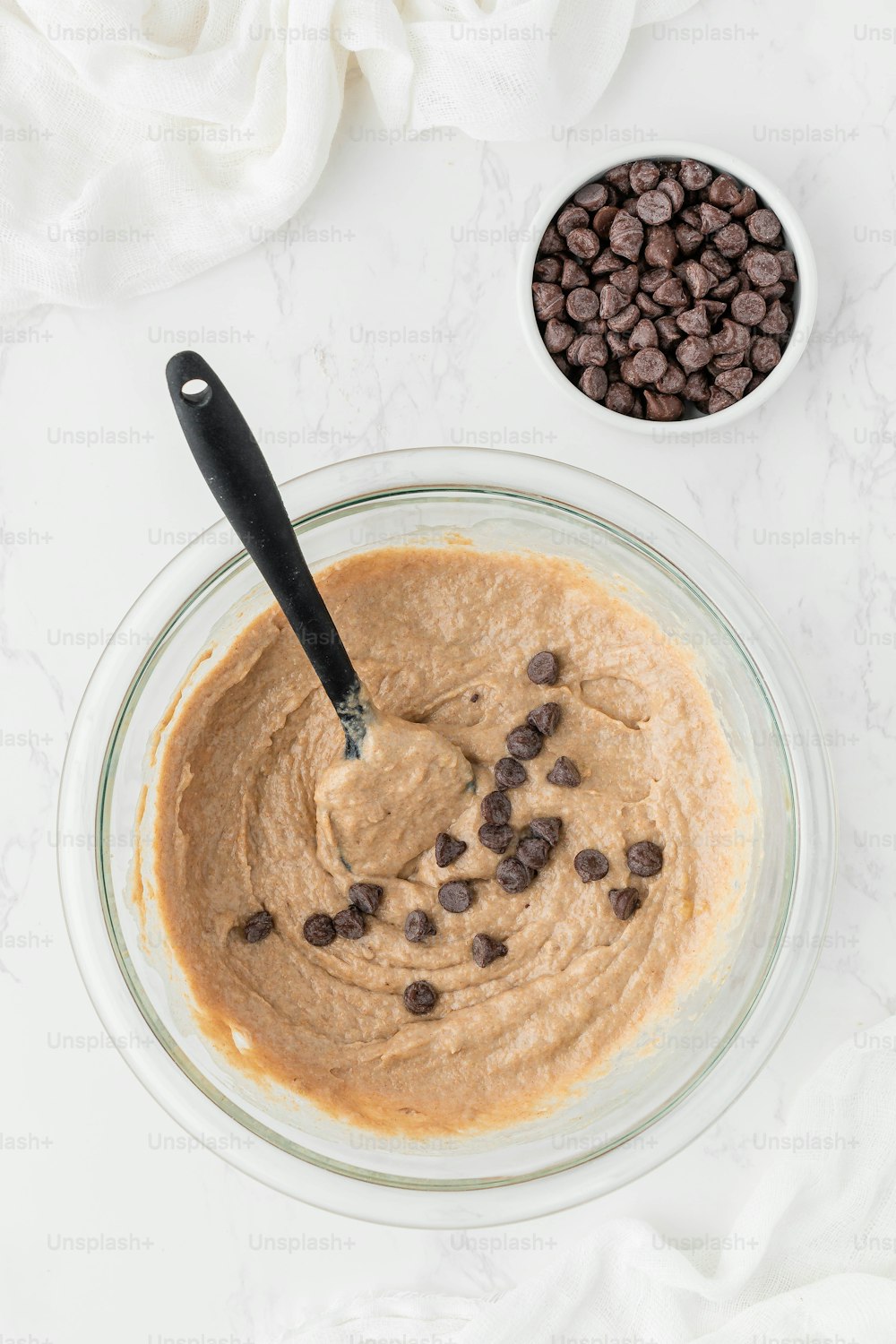 a bowl of cereal with milk and chocolate chips