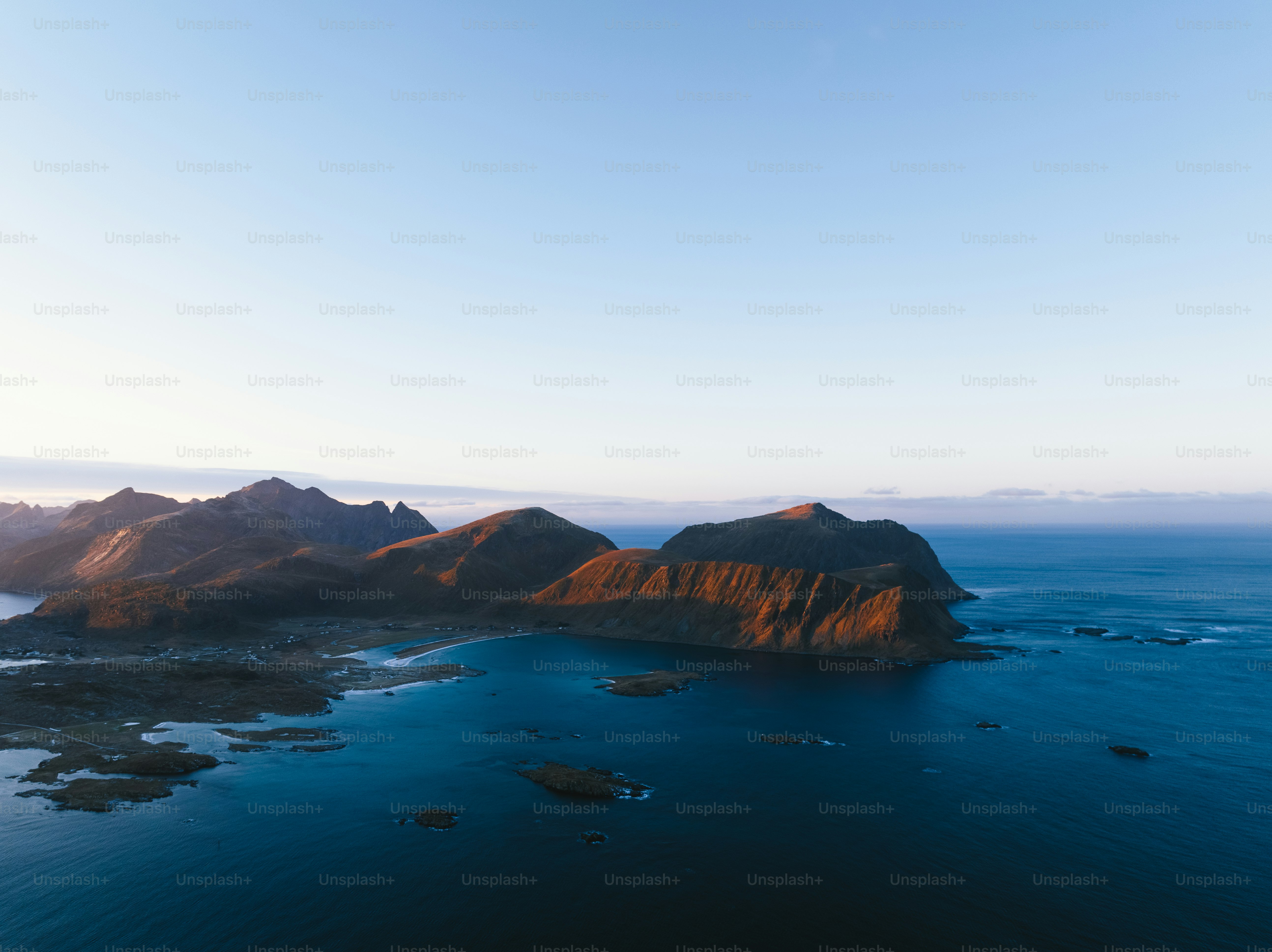 a body of water with land in the distance