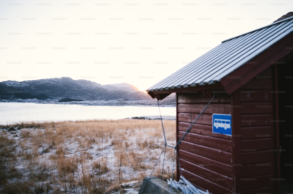 a cabin in a snowy field