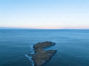 a body of water with rocks in it