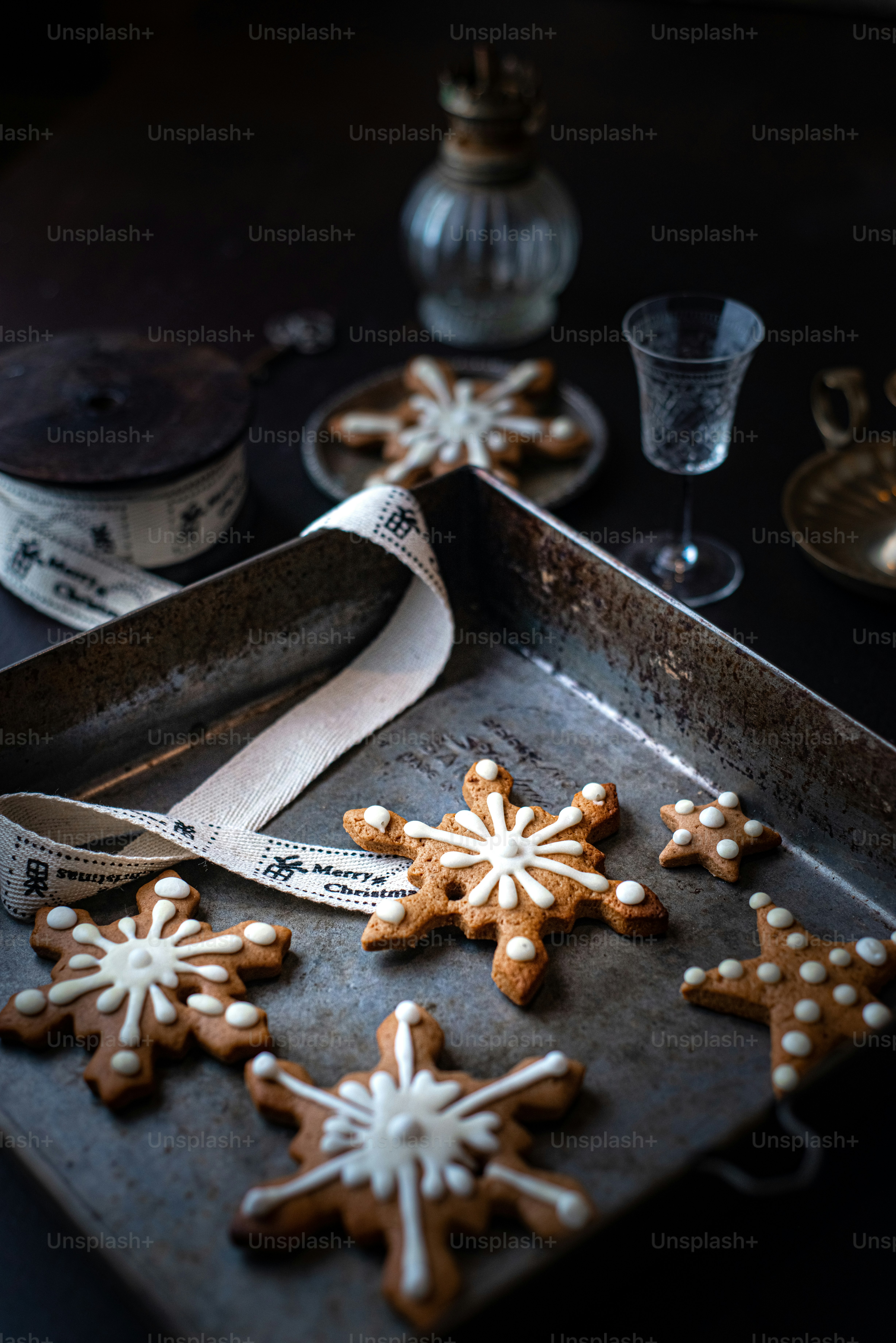 a table with a knife and a glass of water