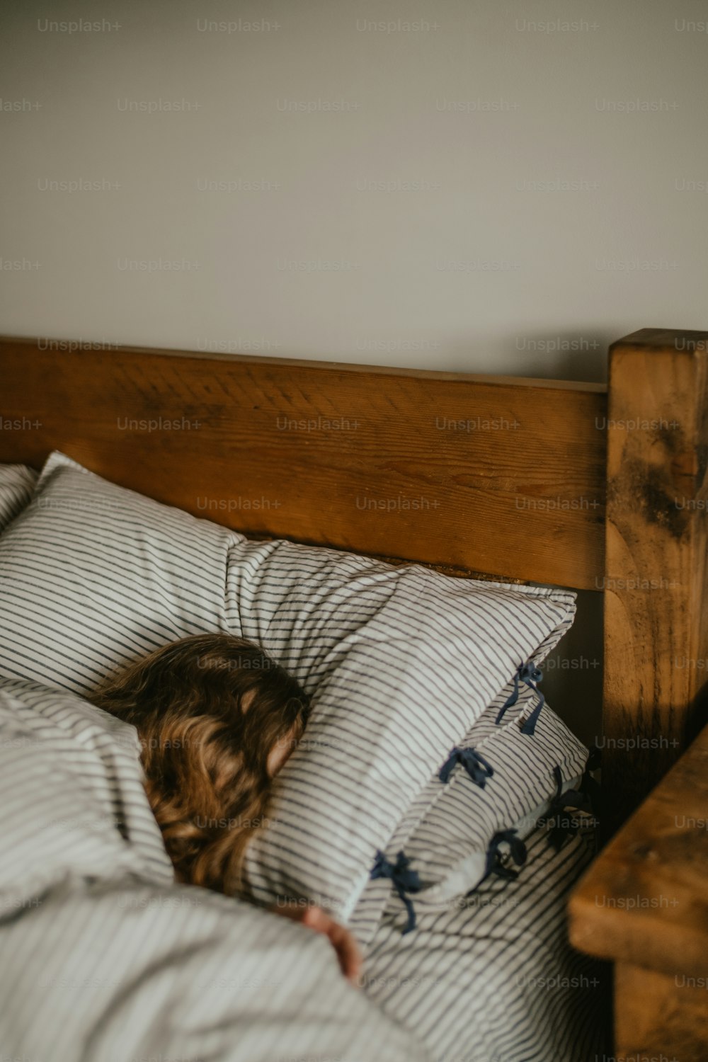 a person sleeping in a bed