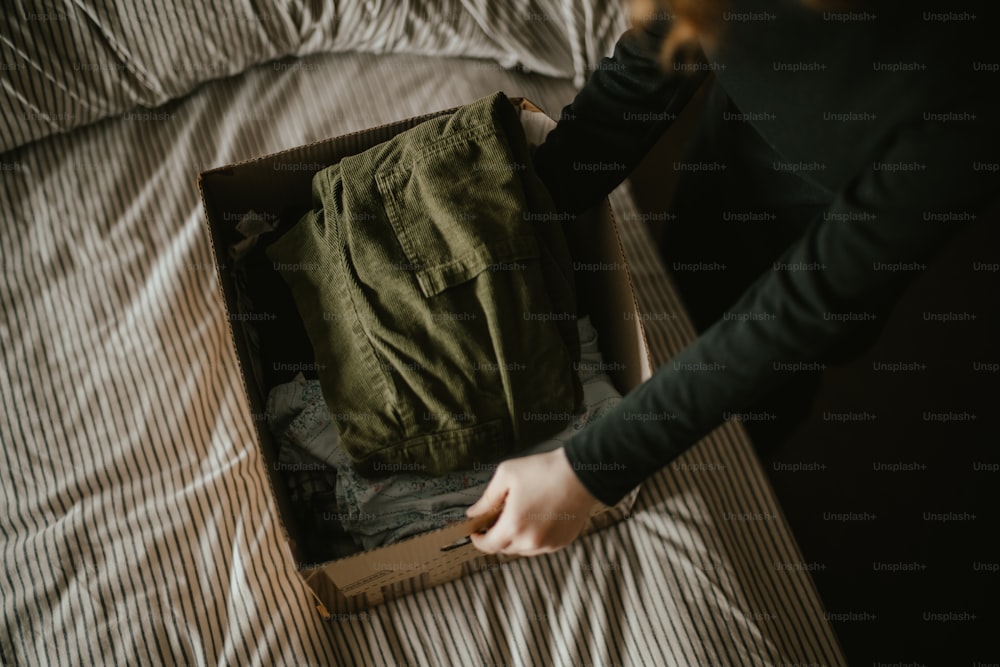 a person holding a box