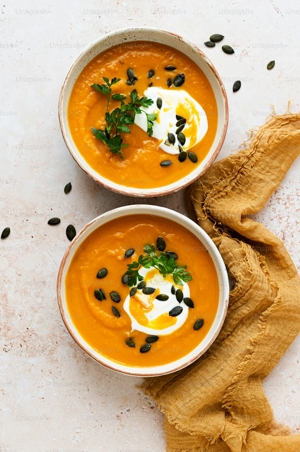 a couple of bowls with food in them