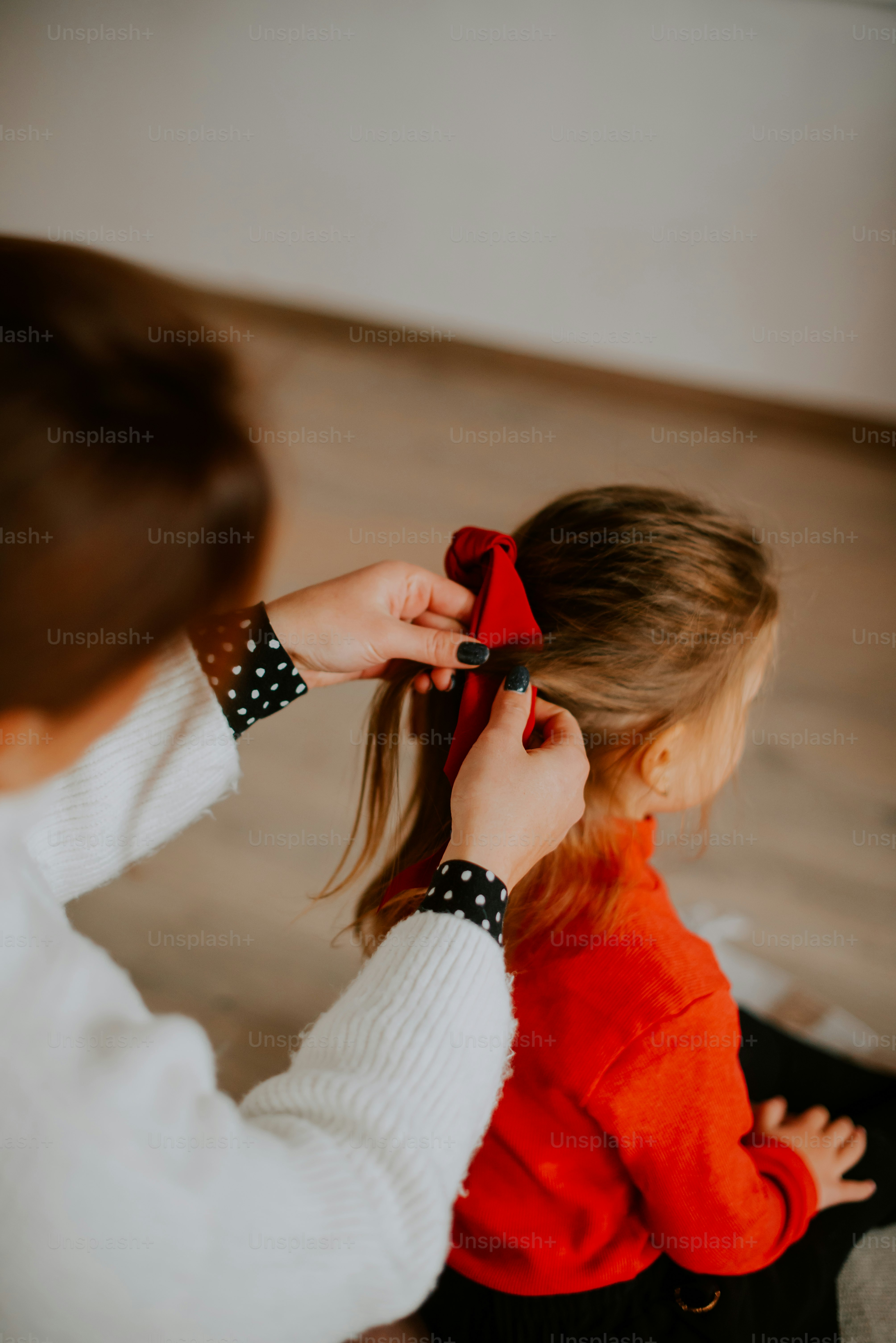 a person getting the hair done