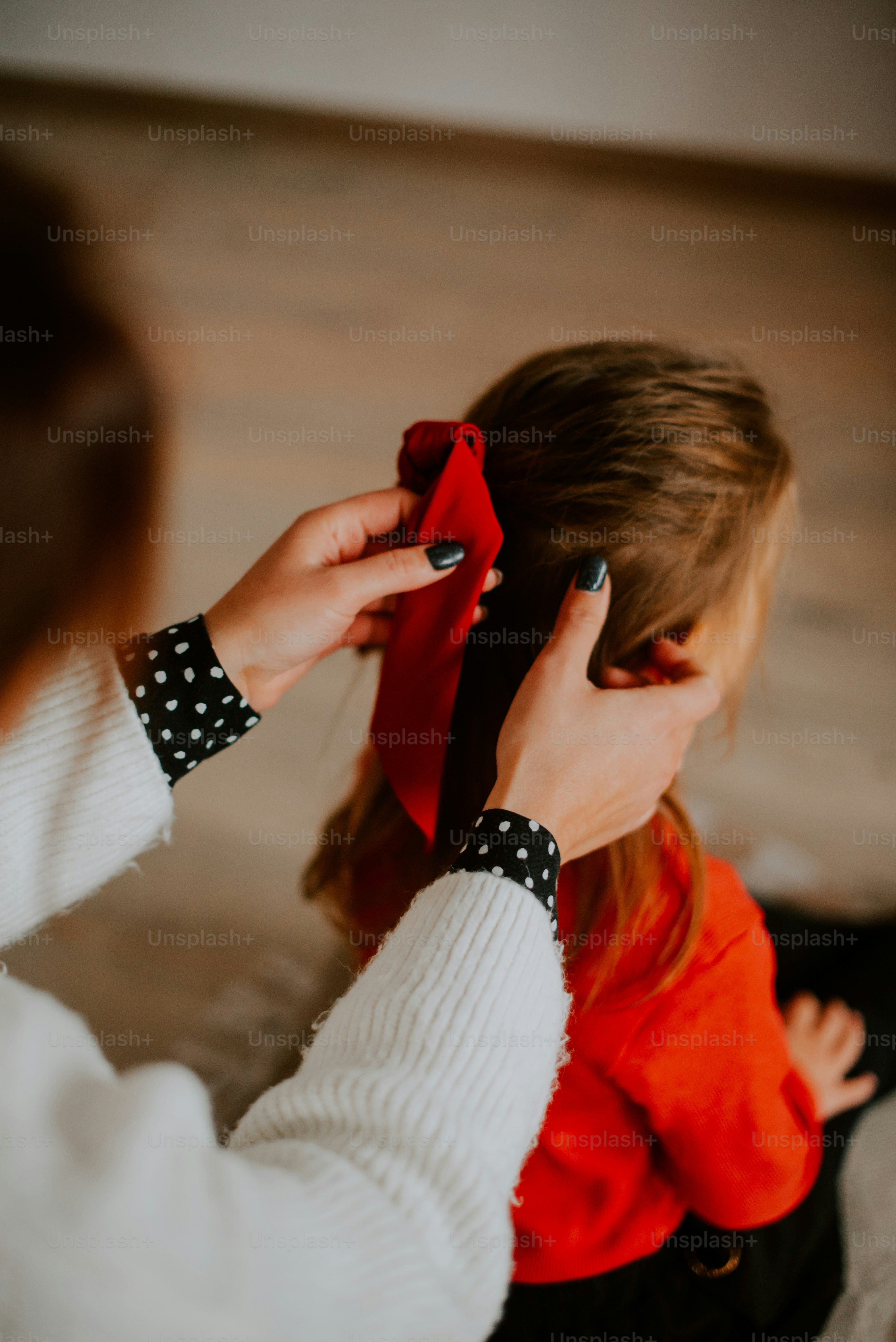 a person holding a phone to the ear