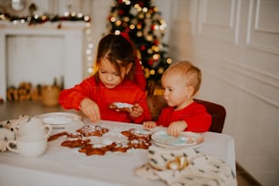 a person and a child eating at a table