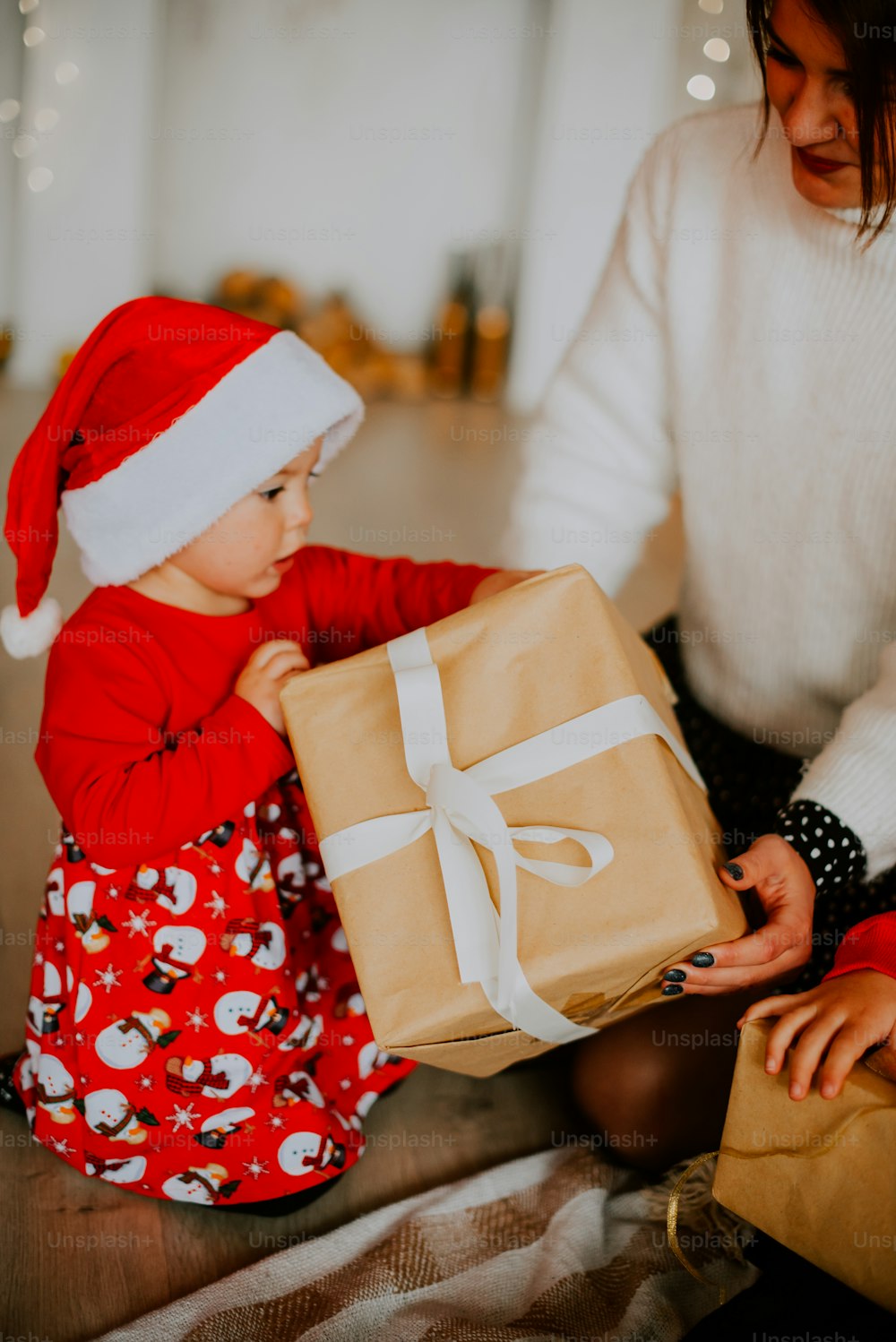 a baby in a santa hat