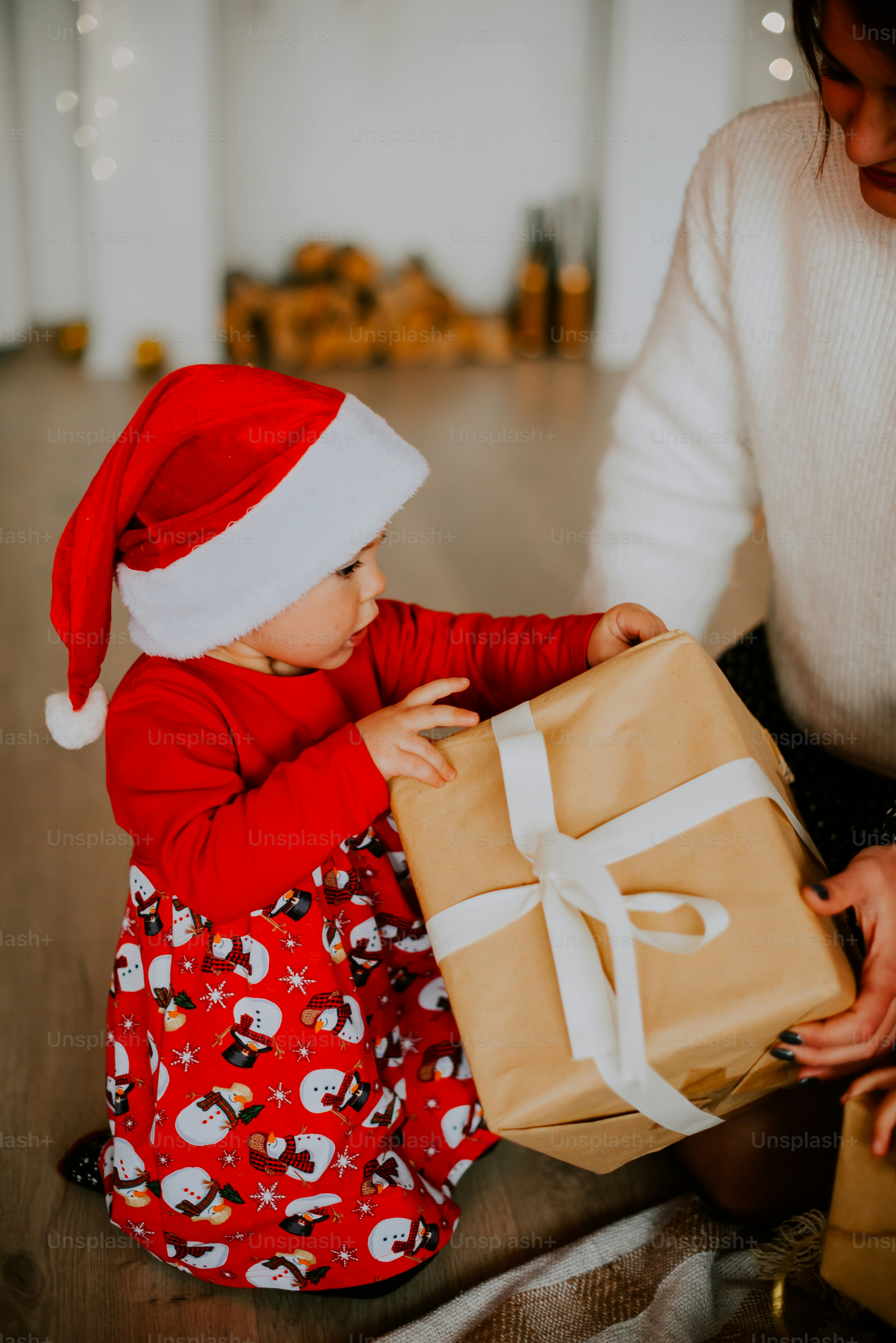 a baby in a santa hat