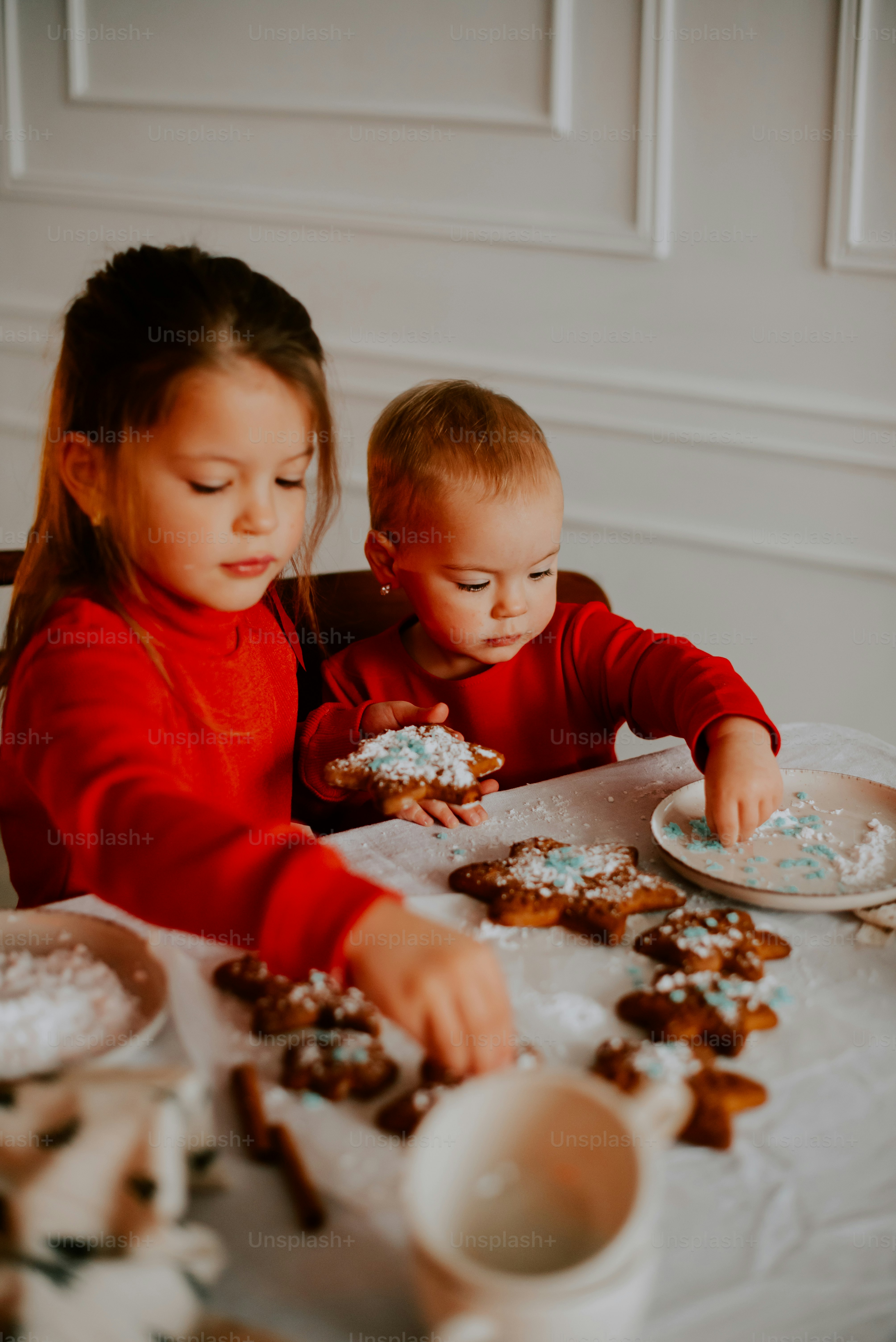 a couple of kids eating food