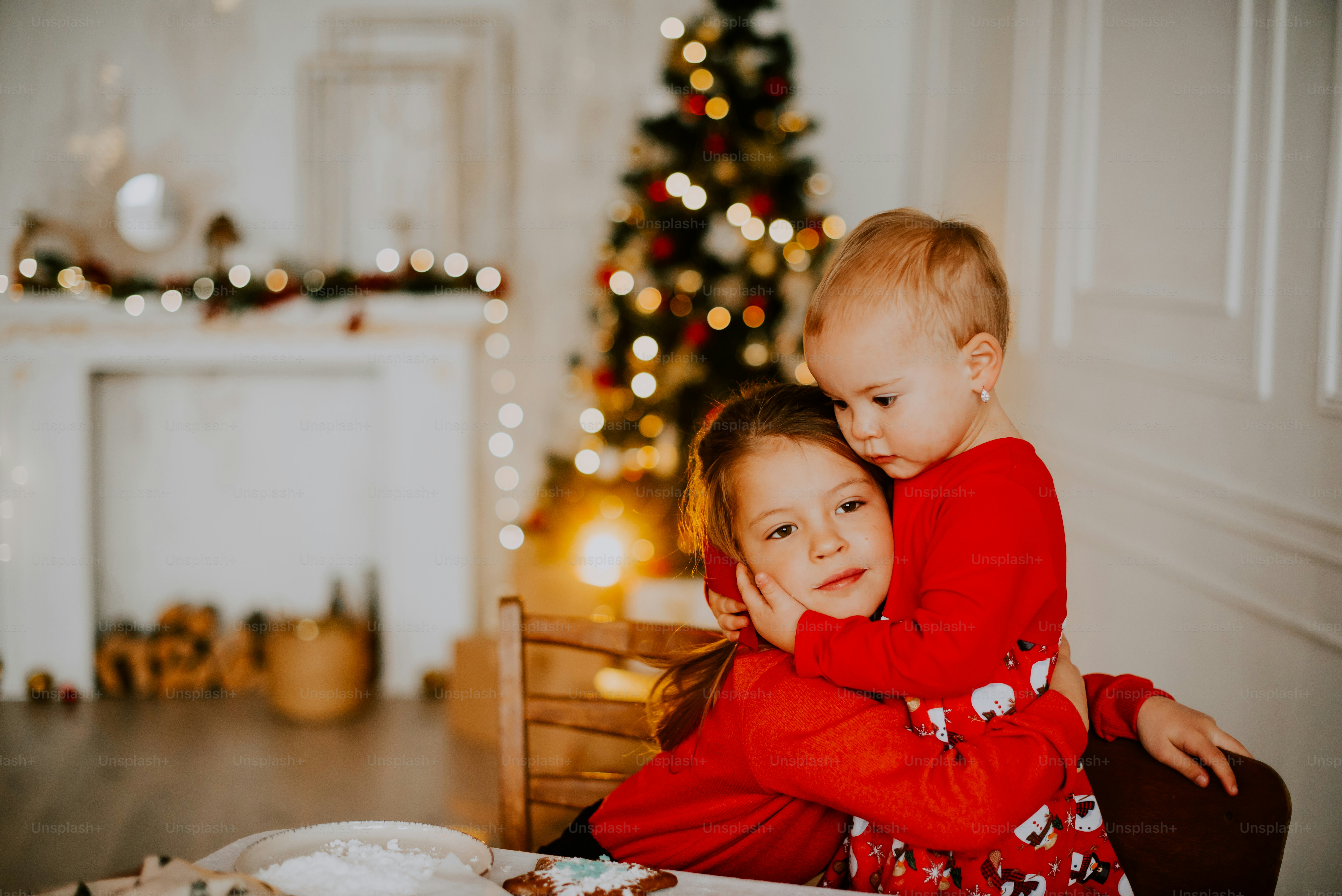 a person holding a child