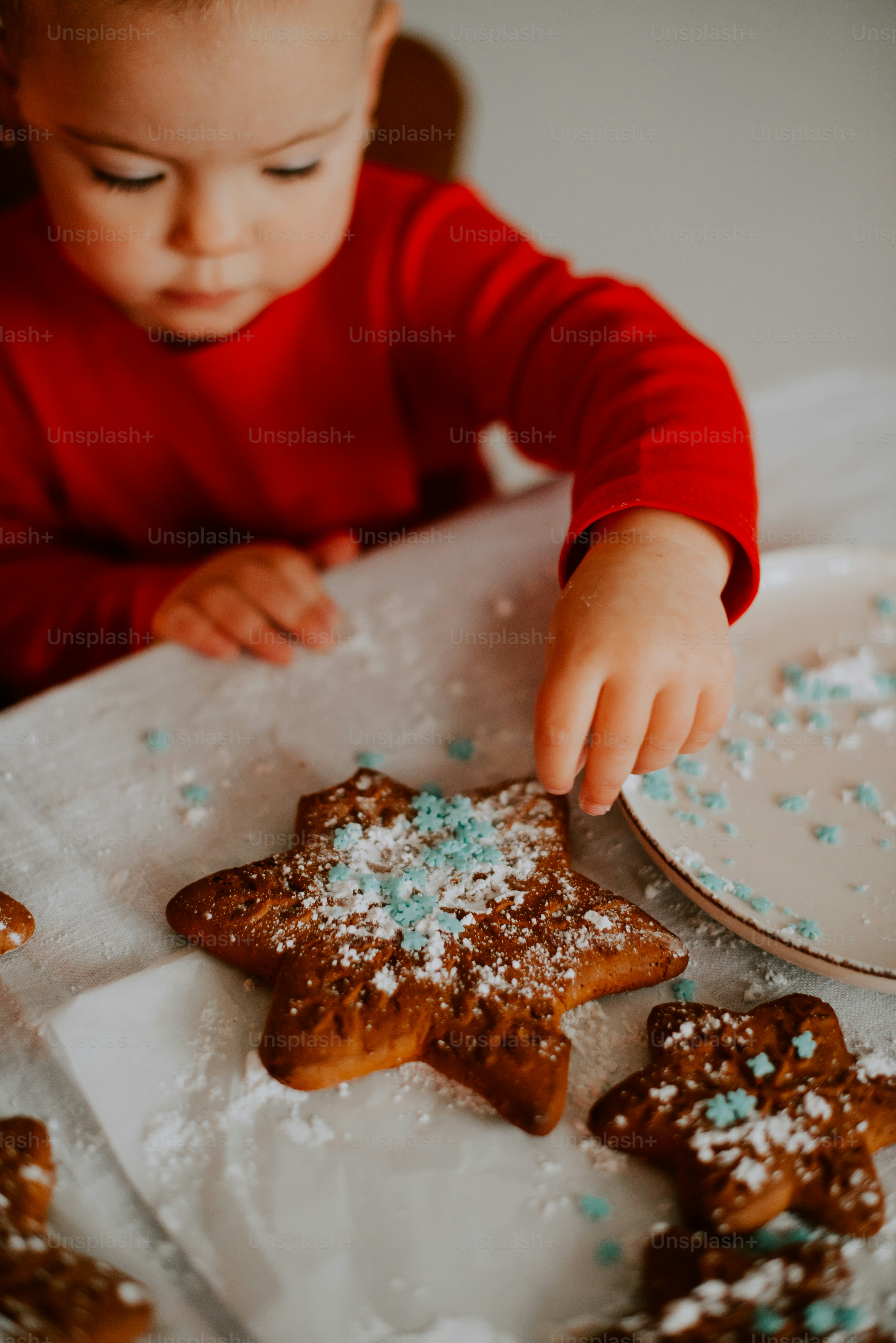 a baby eating a donut