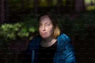 a woman in a blue jacket