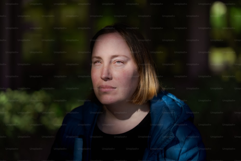 a woman with a blue jacket