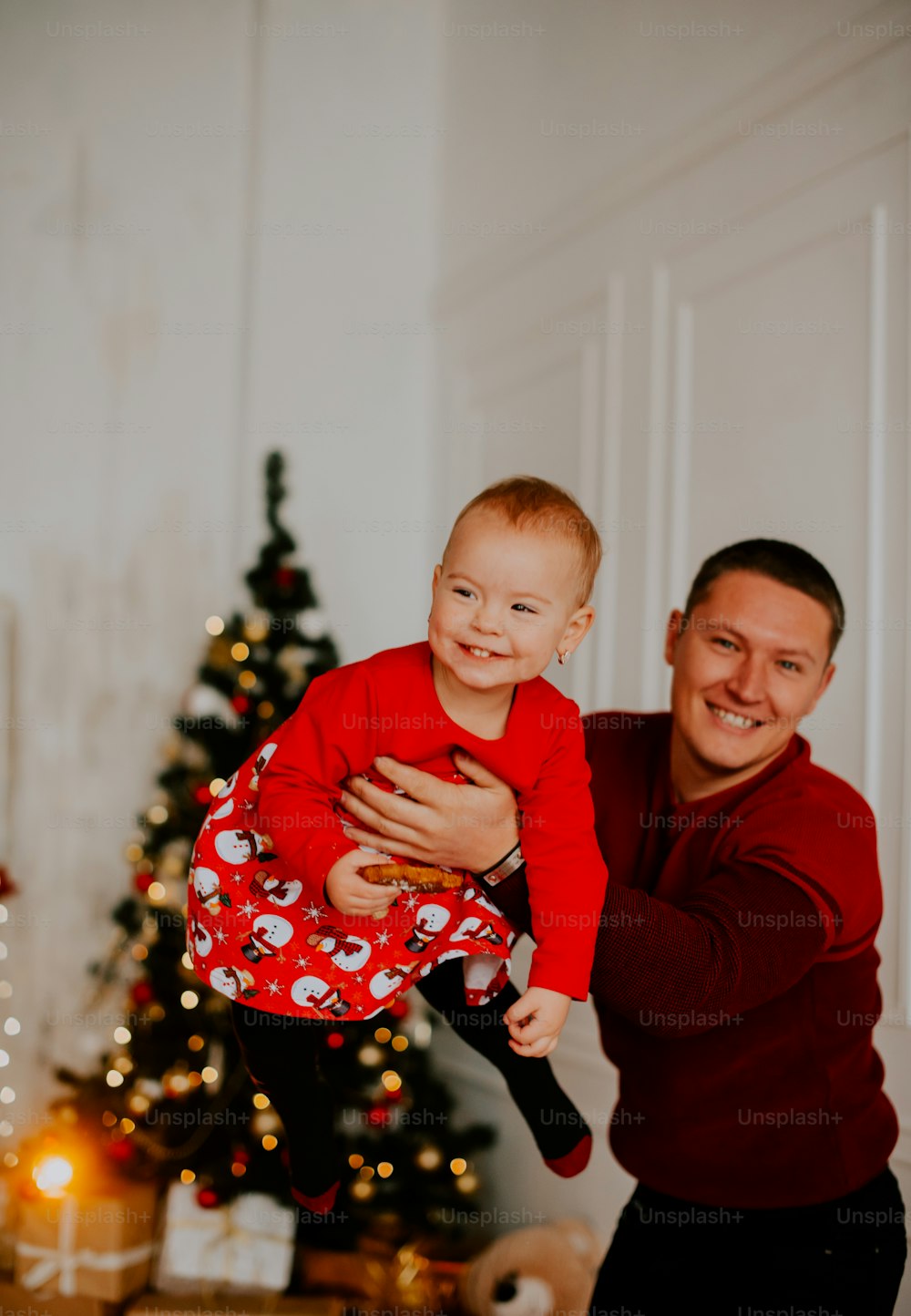 a person holding a baby