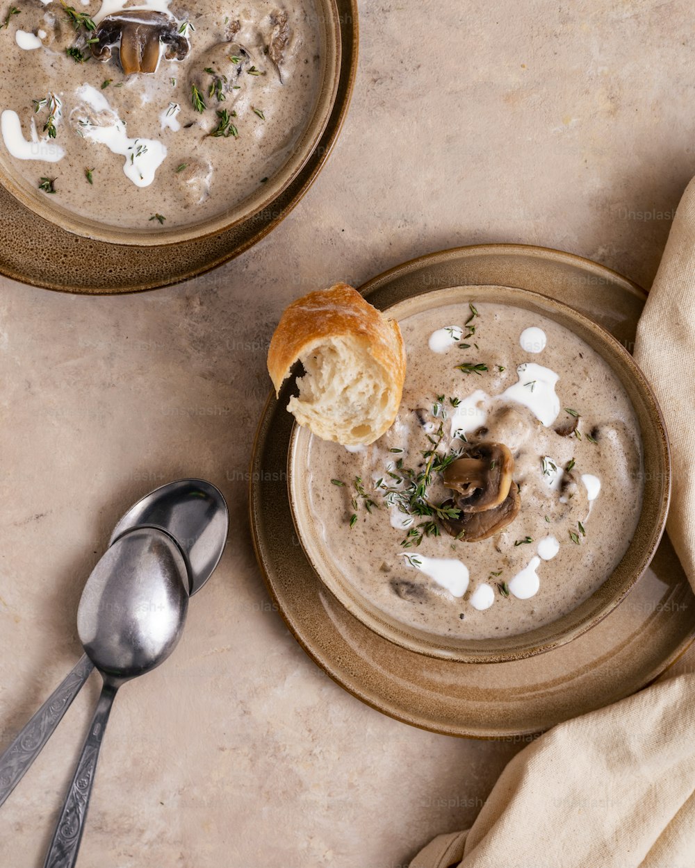 a bowl of soup with a spoon