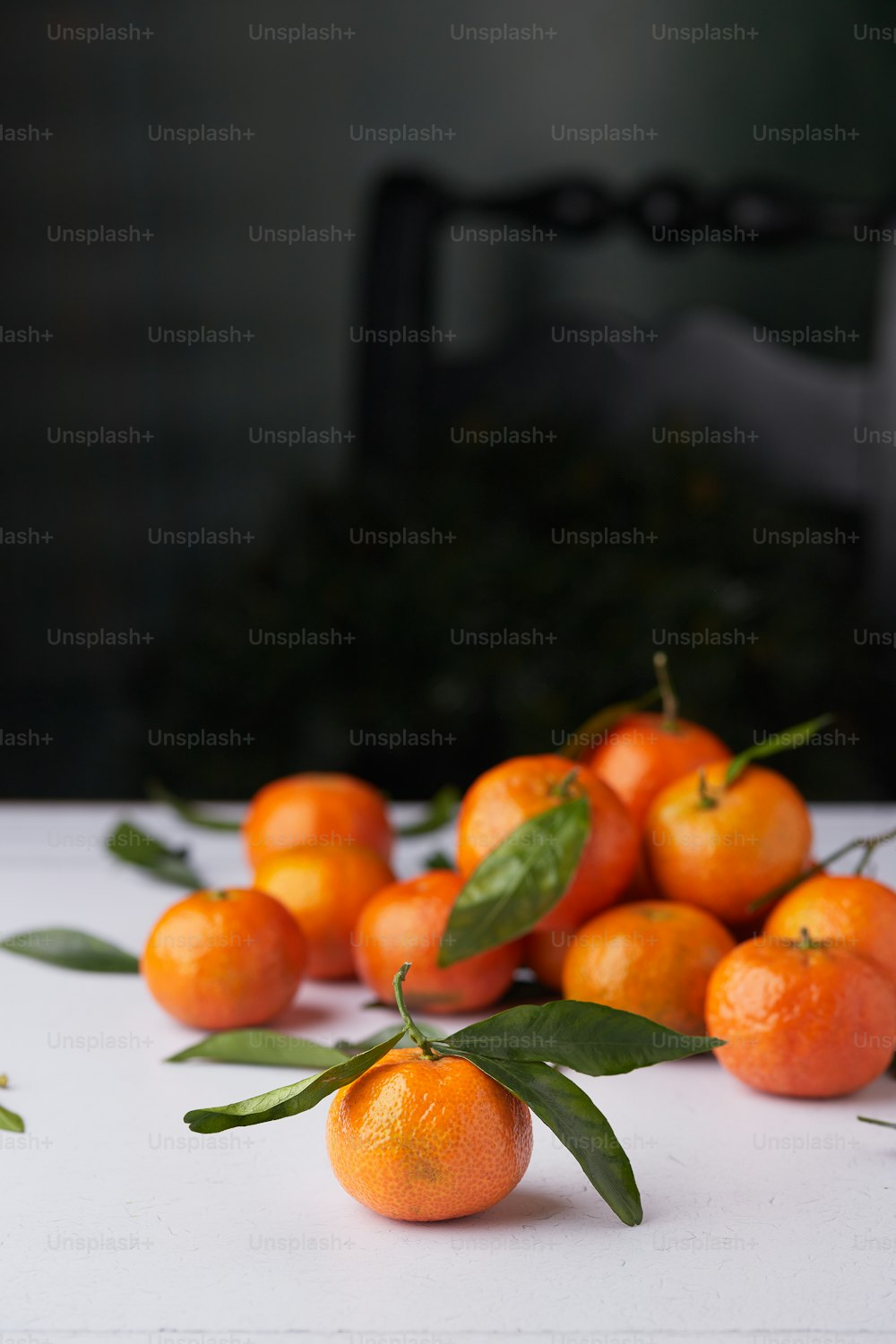 a bunch of oranges on a table