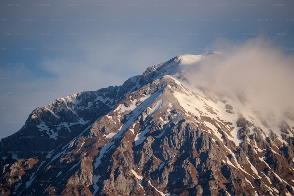 a mountain with snow