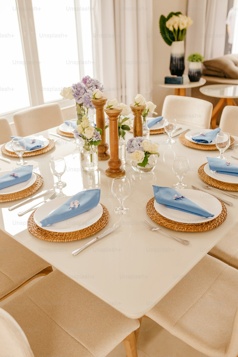 a table set with plates and glasses