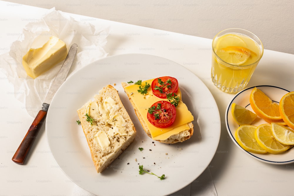 a plate of food and a glass of juice