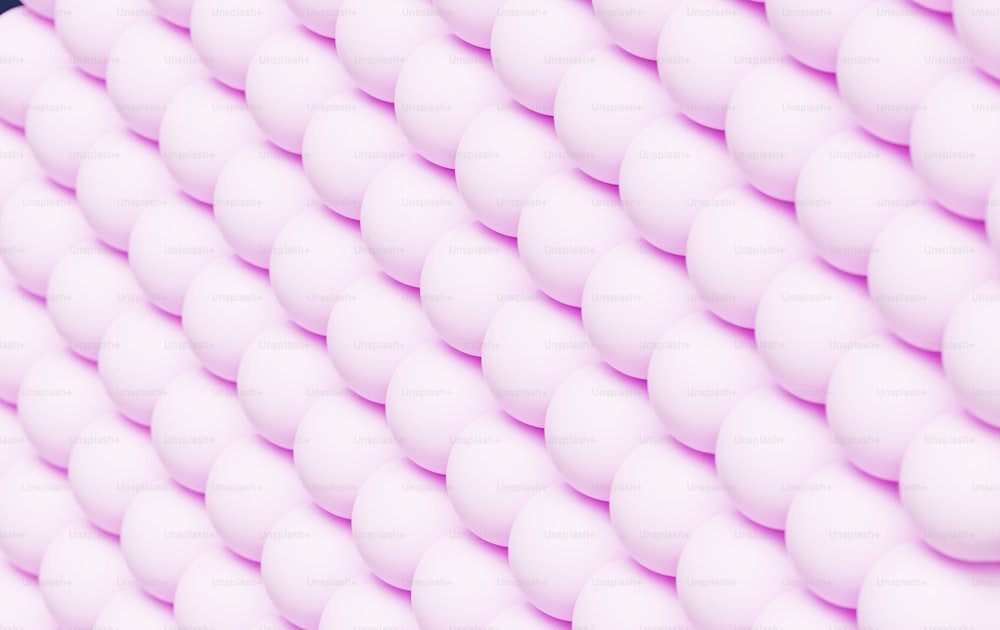a large group of pink marshmallows