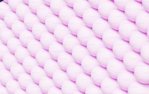 a large group of pink marshmallows