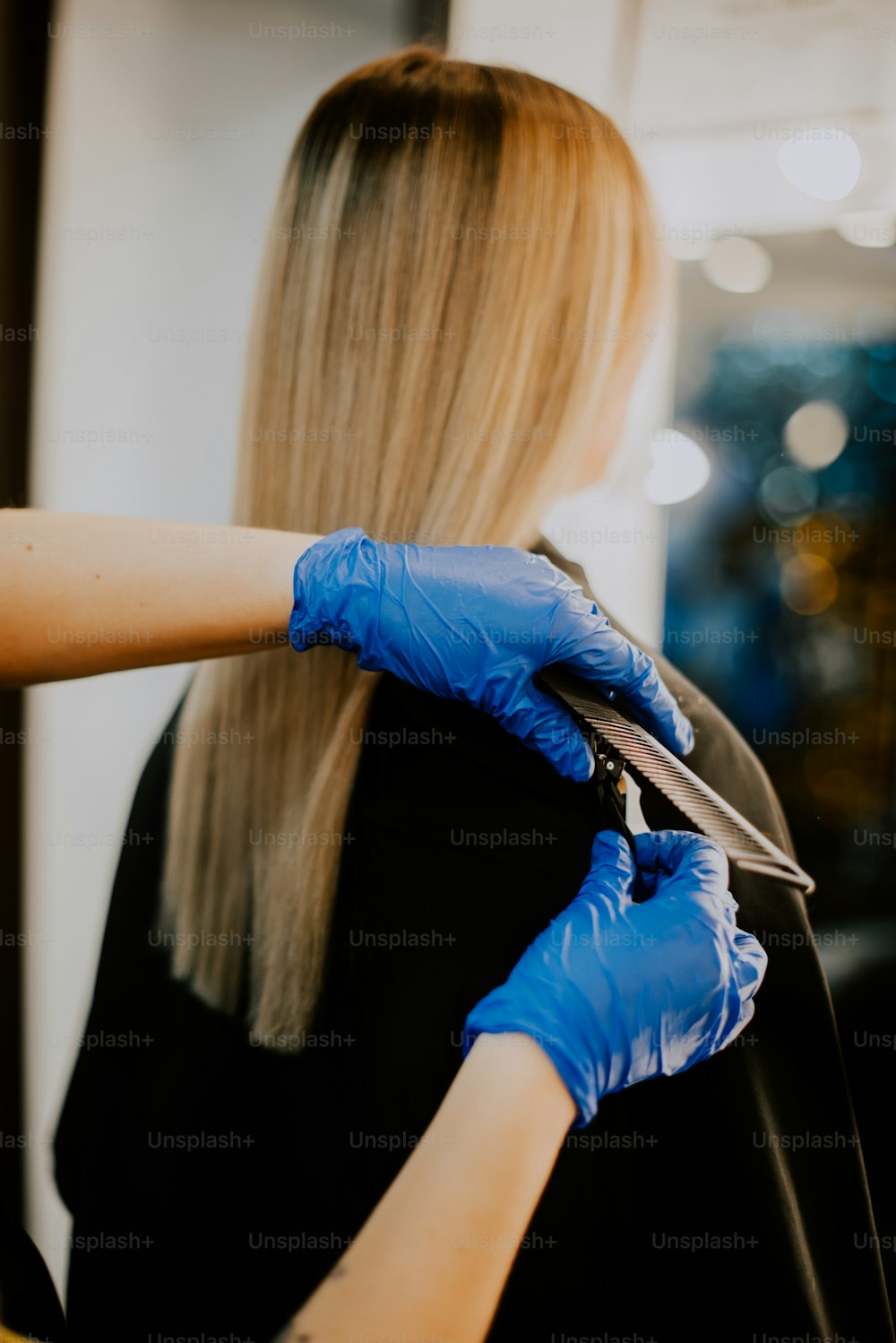 a person wearing a blue glove