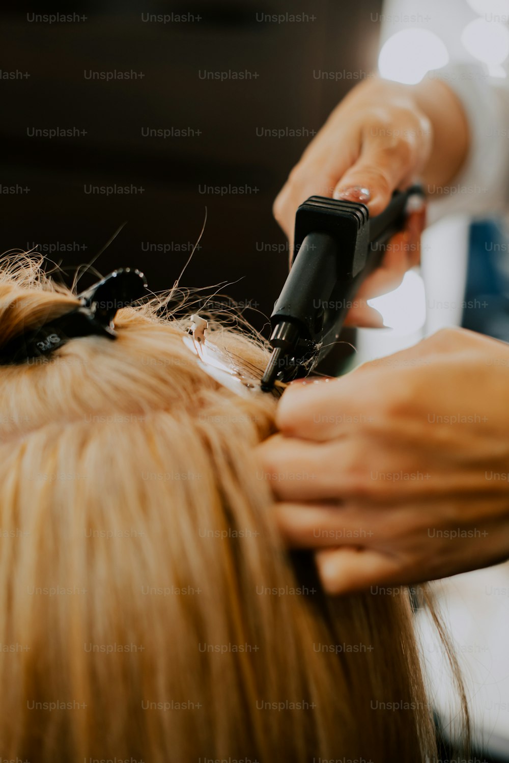 a person cutting a hair