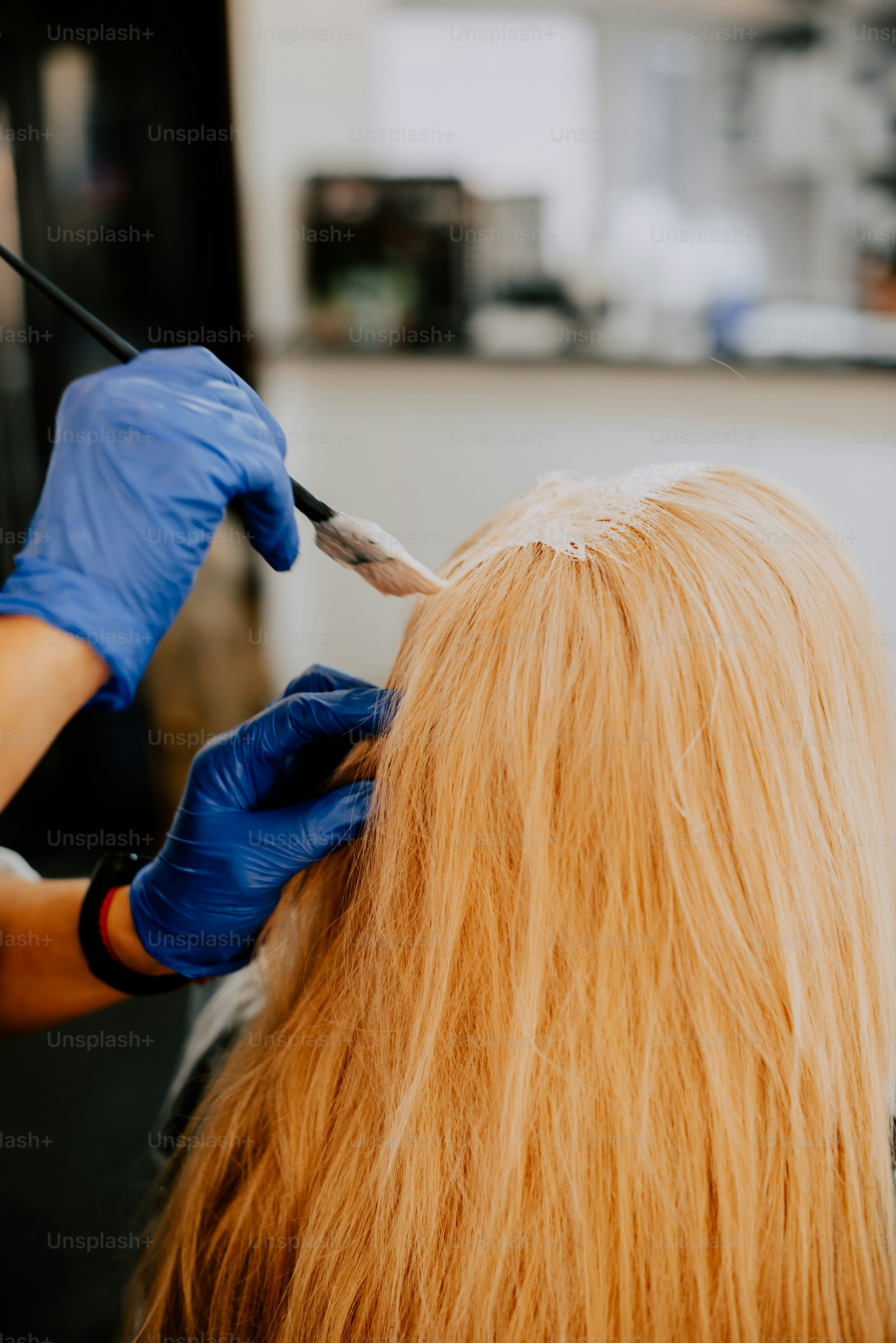 a person using a hair brush