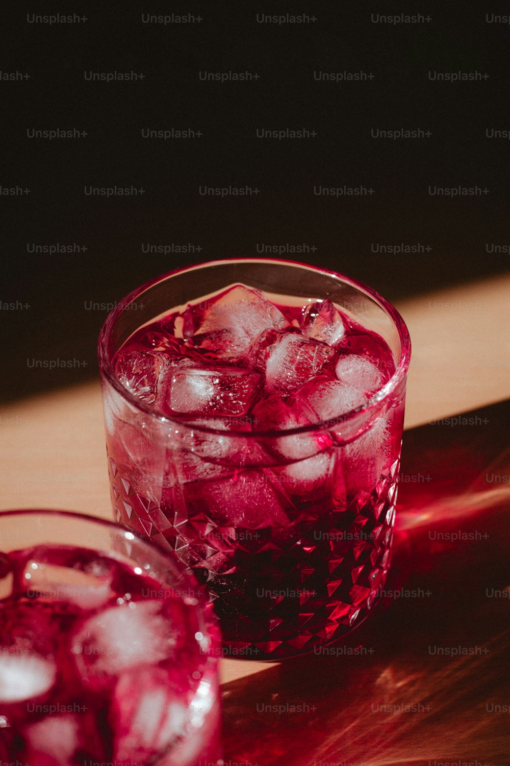 a glass of red liquid