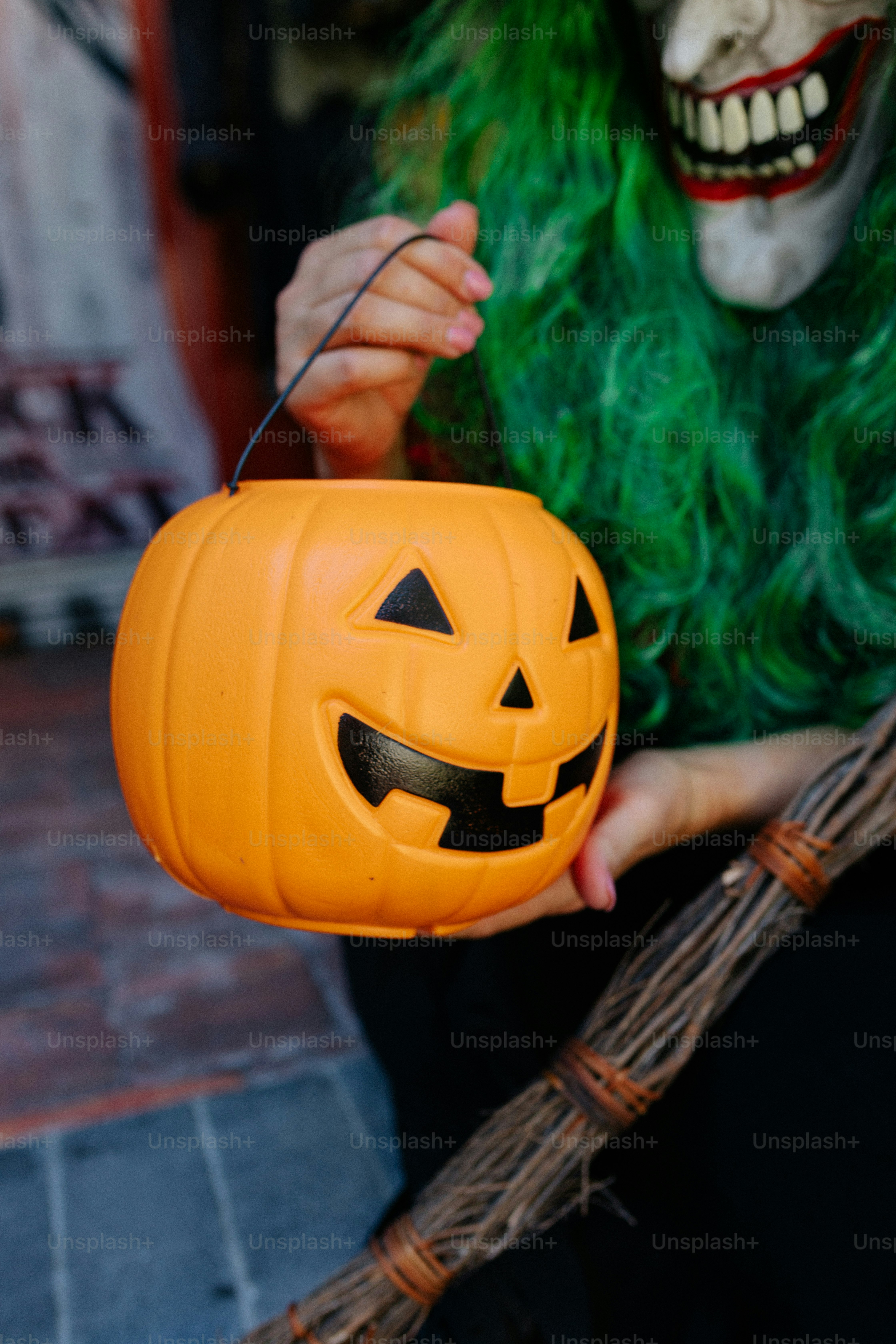 a person in a garment holding a basketball