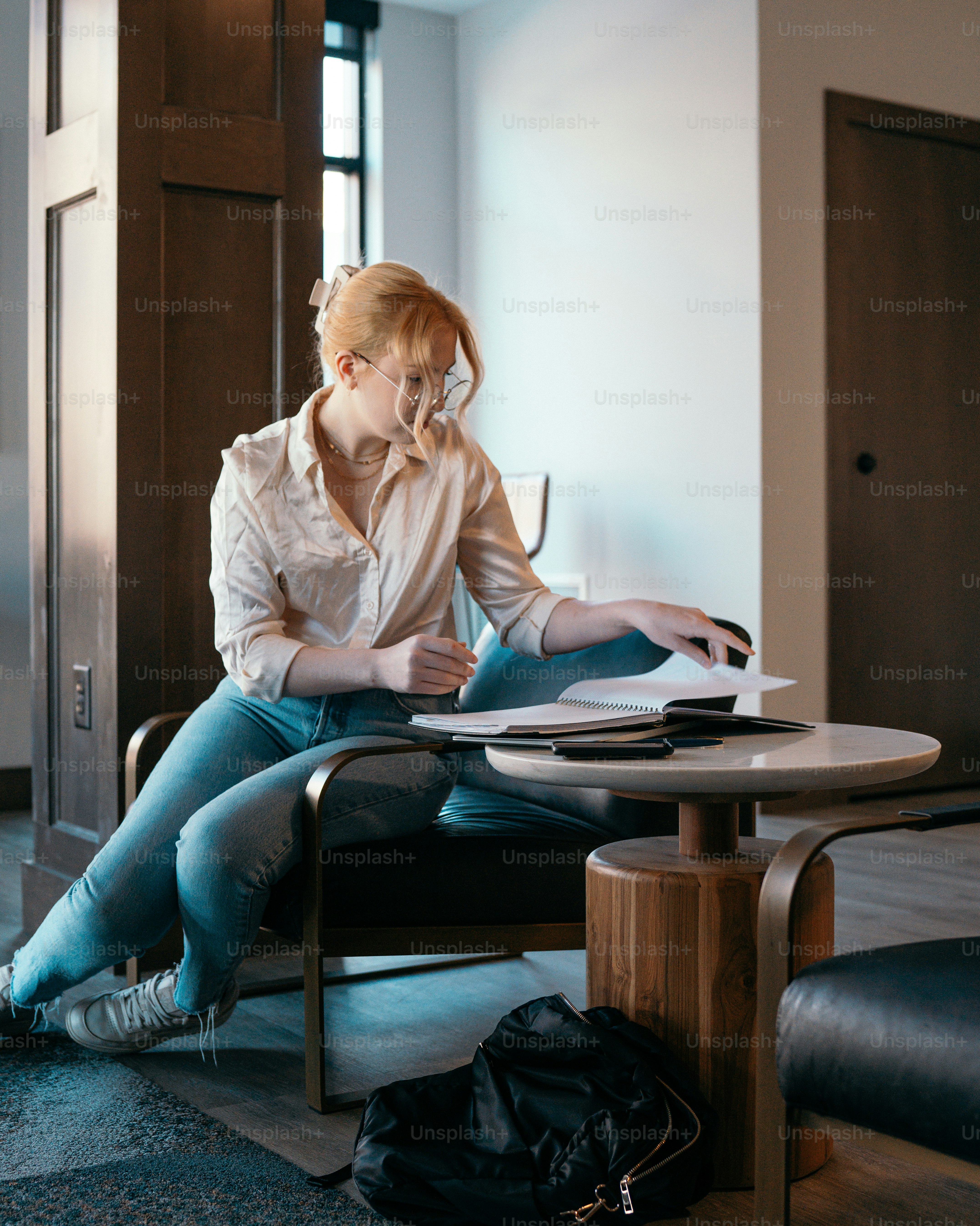 a woman sitting at a desk